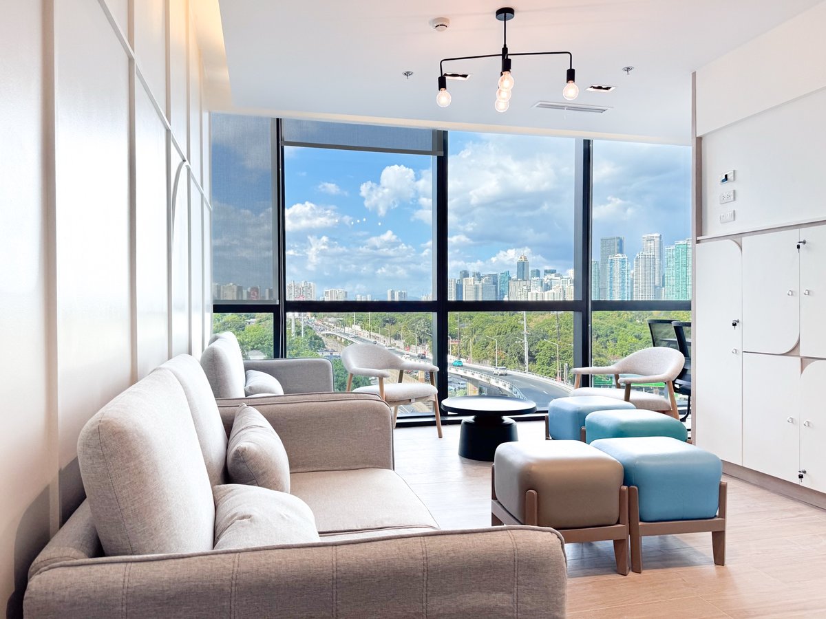 Experience executive wellness in a modern, high-rise check-up lounge.