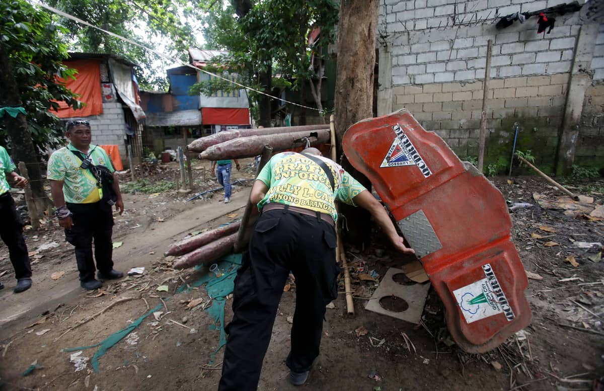 (July 10 2026) Local officials in Barangay Bagong Silangan inspect low-lying areas, the position of rescue boats and to monitor flood-prone communities on Friday July 10 2026, ahead of expected heavy rains brought by the Southwest Monsoon, enhanced by the effects of Typhoon Inday. Photo/Analy Labor