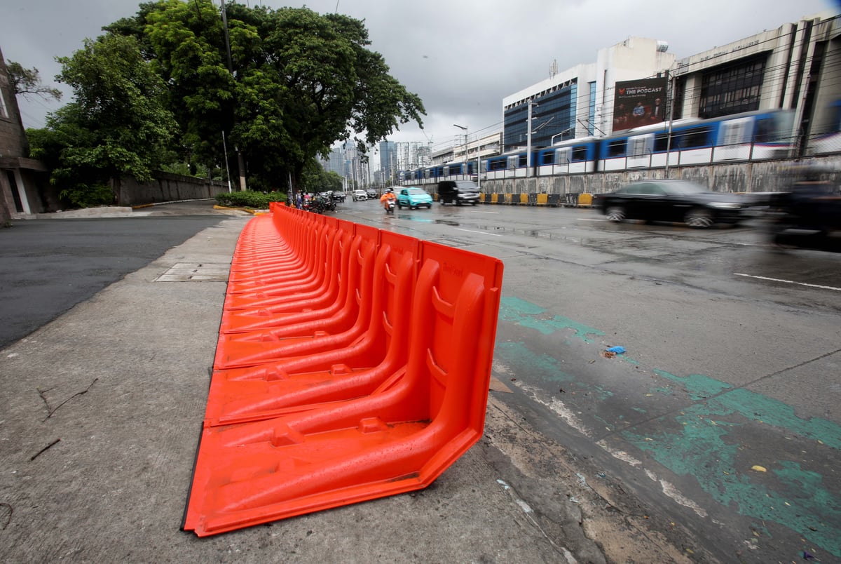 (July 10 2026) In preparation for the impact of Inday, the MMDA has prepositioned flood barriers in front of Gate 4 of the Camp Aguinaldo in Quezon City on Friday, July 10, 2026, to block flood water flowing from the camp and prevent it from reaching EDSA. Photo/Analy Labor