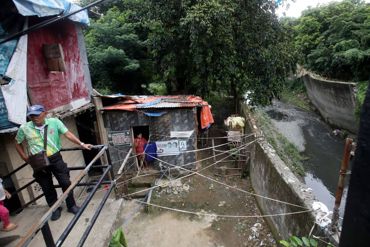 (July 10 2026) Local officials in Barangay Bagong Silangan inspect low-lying areas, the position of rescue boats and to monitor flood-prone communities on Friday July 10 2026, ahead of expected heavy rains brought by the Southwest Monsoon, enhanced by the effects of Typhoon Inday. Photo/Analy Labor