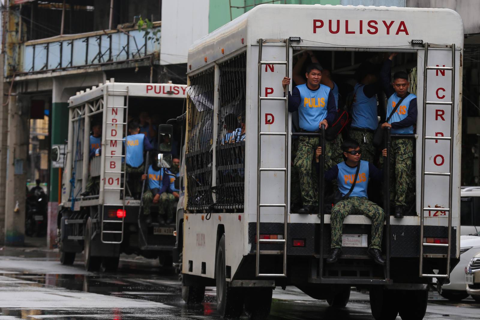 Concrete barriers, razor wire, and container vans block roads leading to the Malacañang Complex in Manila on 10 July 2026 as authorities tighten security ahead of an anti-corruption protest at Liwasang Bonifacio organized by an interfaith group.