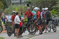 ATHLETES share a light moment before taking on the official bike route familiarization, an essential part of their preparations for the 5150 Bohol Triathlon.