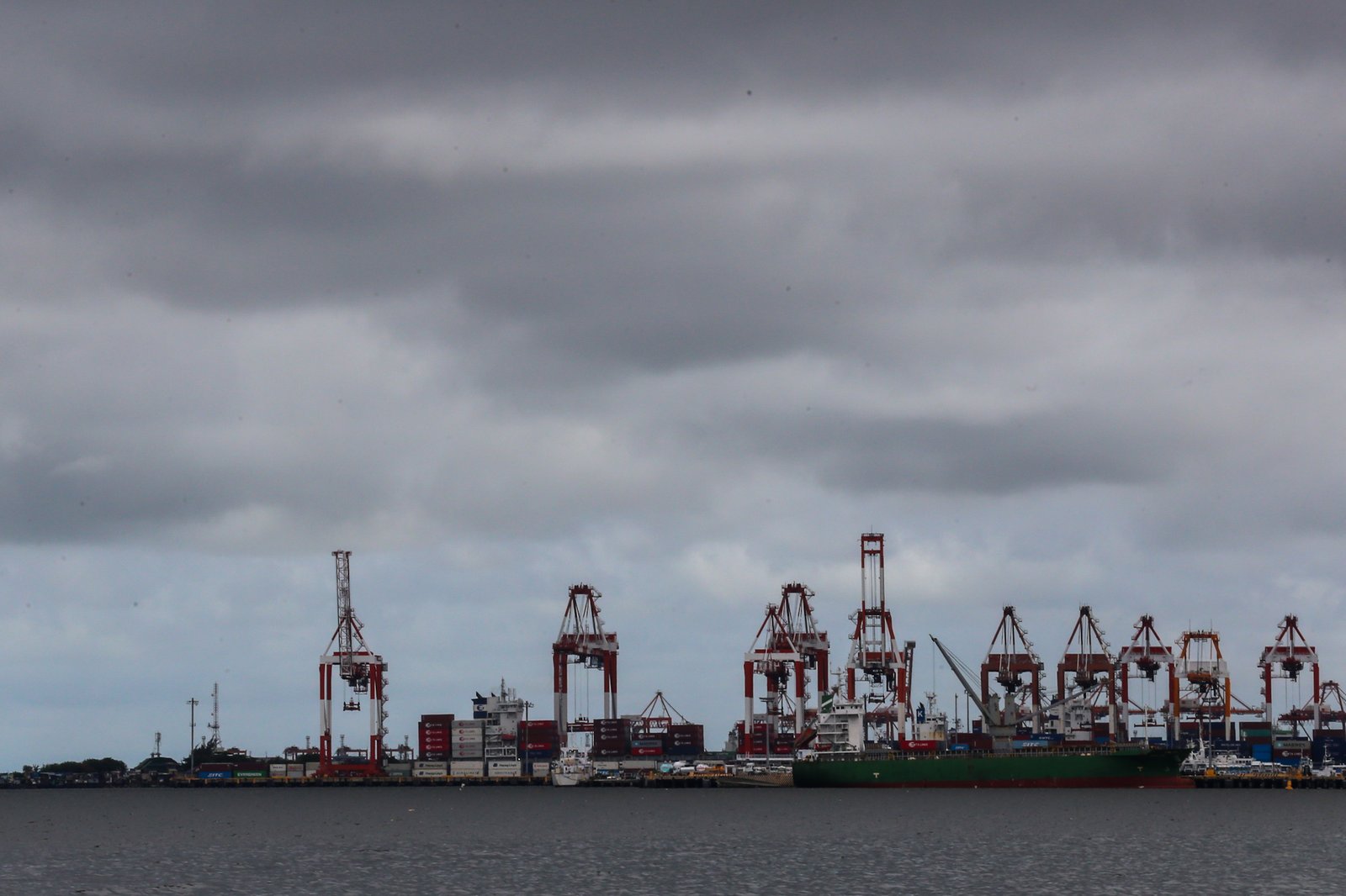 Dark clouds gather over Manila Bay as Typhoon Inday weakens and exits the Philippine Area of Responsibility on 11 June 2026. Face-to-face classes for tertiary and postgraduate students in public and private schools in the City of Manila have been suspended due to forecasts of moderate to heavy rainfall throughout the day.