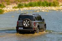 WADING through shallow water, the BAIC B40e Trailmaster rEV shows the off-road ability behind its electrified drive system.