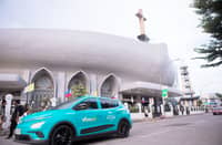 DAVAO commuters get a quieter ride aboard a Green GSM electric taxi near San Pedro Cathedral.