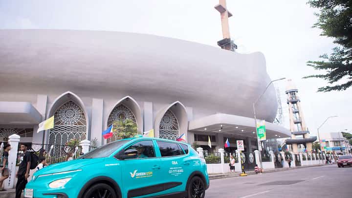 DAVAO commuters get a quieter ride aboard a Green GSM electric taxi near San Pedro Cathedral.