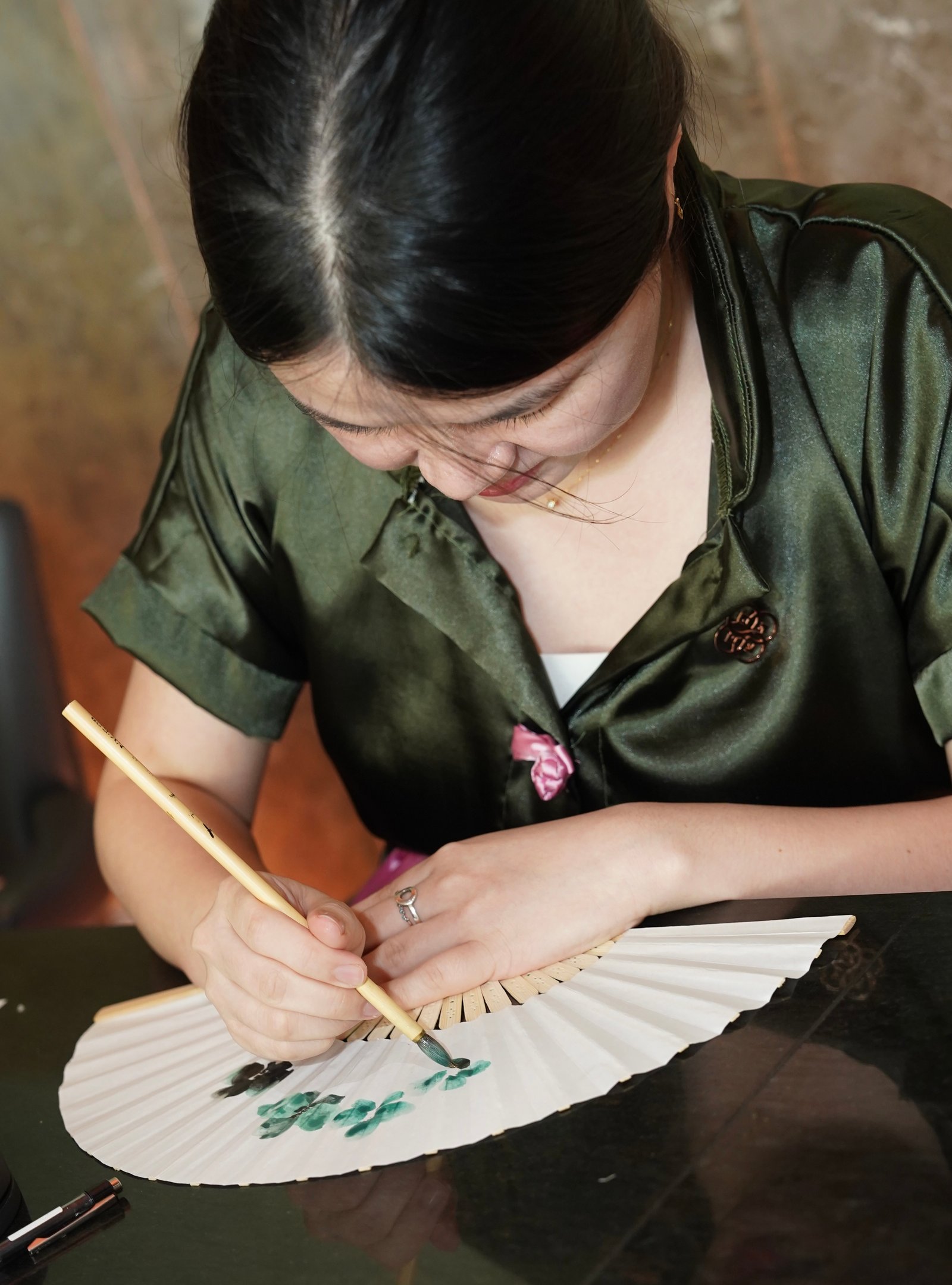 A calligrapher artist during ‘Symphony of Senses.’