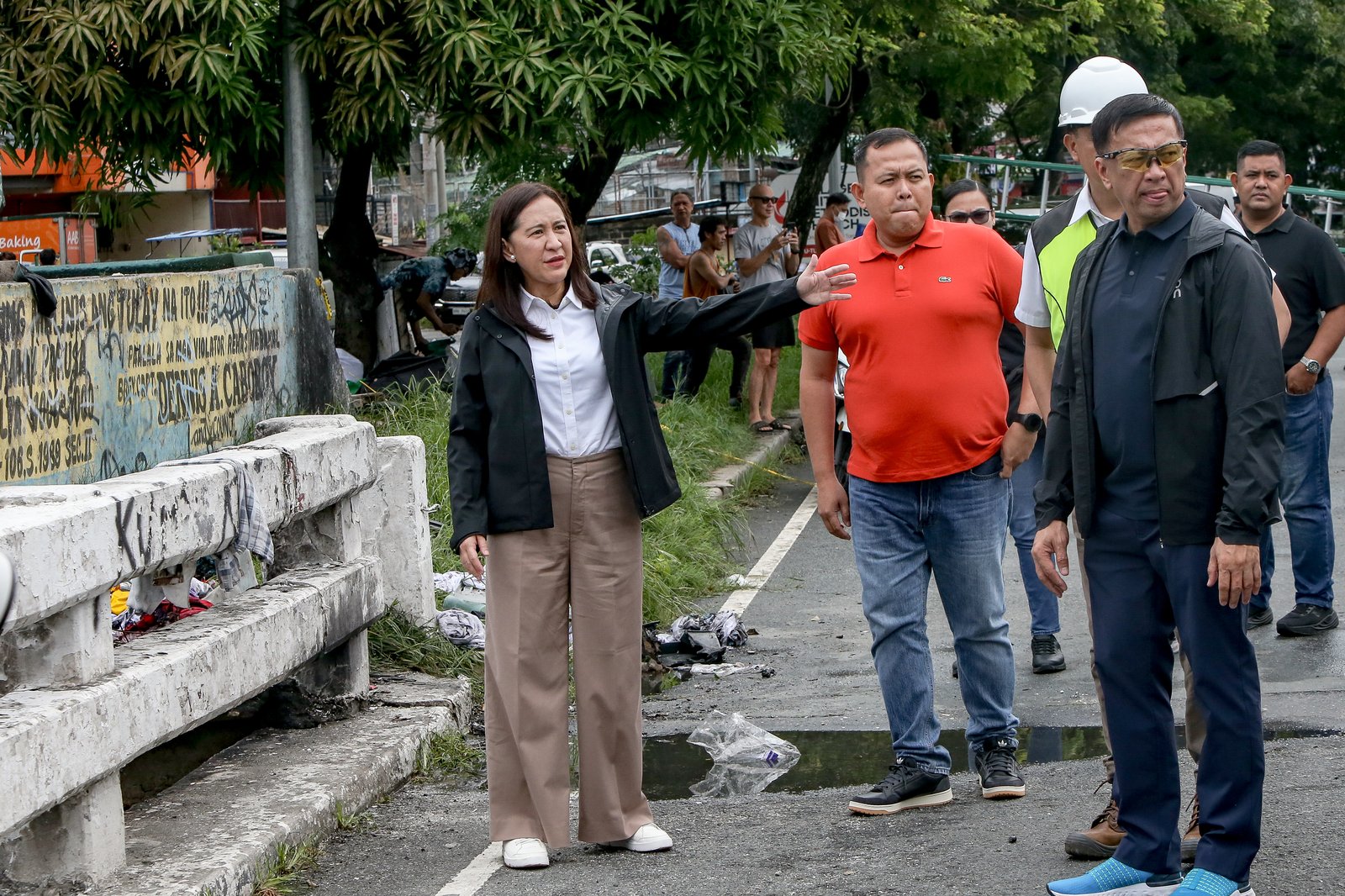 A fourth-alarm fire razed 46 houses beneath Culiat Bridge II along Congressional Avenue in Quezon City on Saturday night before it was declared out at 11:26 p.m. The Quezon City government said 38 families were affected, including residents of a nearby house. Authorities continue to assess the damage, with road closures in place as investigators examine the area, where damaged utility lines and a long crack on the bridge's asphalt surface were observed.