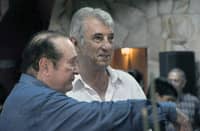 CONMEBOL president Nicolas Leoz (L) speaks with former Argentine footballer Antonio Ubaldo Rattin during a meeting at Leoz's country residence, El Arriero, in Ypacarai, 40 km from Asuncion, on January 28, 2009. Former midfielder Antonio Ubaldo Rattin, regarded as one of the greatest idols in Boca Juniors' history, died on July 11, 2026, at the age of 89, according to the club.