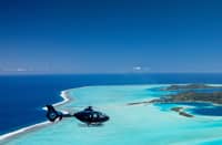 BORA Bora, Santorini and the Maldives are no longer just honeymoon destinations. Luxury resorts are seeing a boom in family travel, with more parents returning to their romantic getaway spots — this time with kids and grandparents.