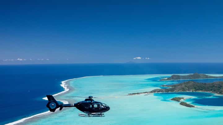 BORA Bora, Santorini and the Maldives are no longer just honeymoon destinations. Luxury resorts are seeing a boom in family travel, with more parents returning to their romantic getaway spots — this time with kids and grandparents.