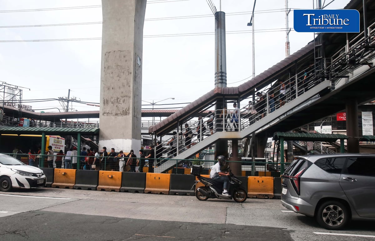 (July 13 2026) Commuters queuing at carousel Roosevelt bus station in Munoz Quezon City on Monday morning July 13 2026. Photo/Analy Labor