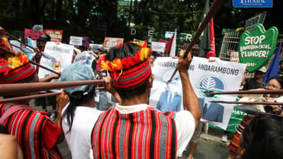 (July 14 2026) Anti-mining residents of Kasibu and Dupax del Norte, Nueva Vizcaya, joined by environmental advocates, march to the Department of Environment and Natural Resources (DENR) Central Office in Quezon City, for a picket-dialogue on Tuesday, July 14, 2026, demanding the revocation of the exploration permit granted to North Luzon Mineral Resources Corporation (NLMRC). The protesters said the permit, approved by the DENR's Mines and Geosciences Bureau in July 2025, covers 4,456 hectares of community land and overlaps with ancestral domain claims in Kasibu. They also alleged that drilling operations began without the free, prior, and informed consent of the affected indigenous communities, in violation of the Indigenous Peoples' Rights Act (IPRA). Photo/Analy Labor