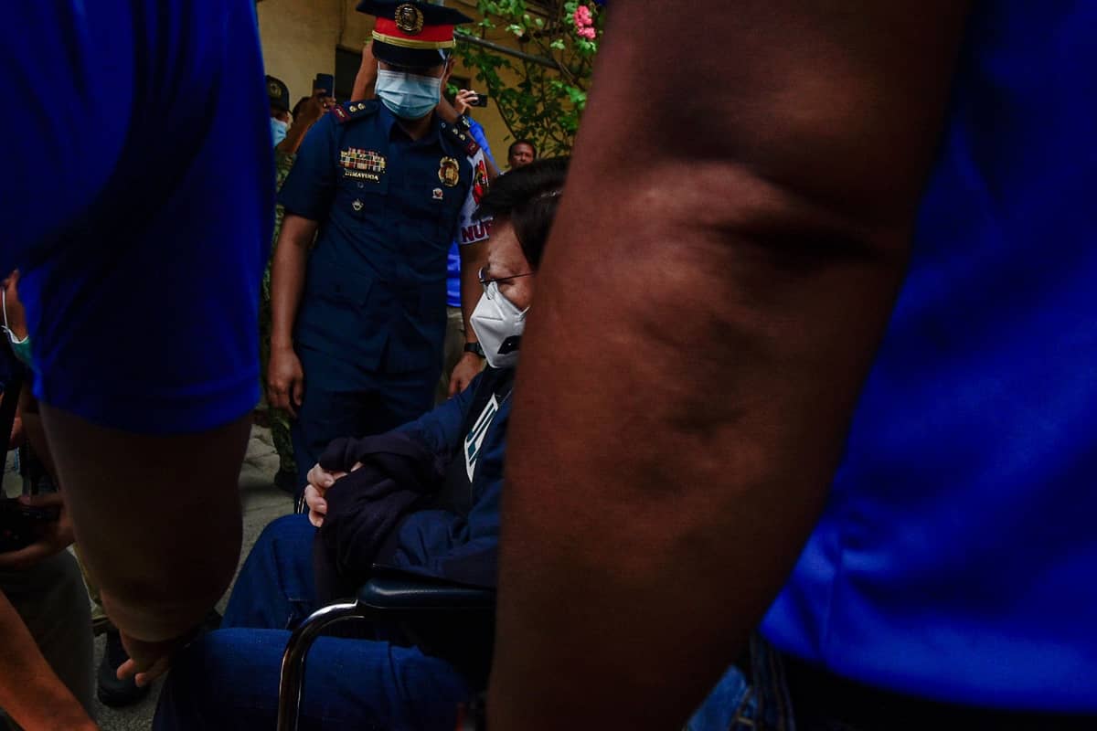 Sen. Rodante Marcoleta arrives at the Philippine General Hospital in a wheelchair under the escort of Criminal Investigation and Detection Group personnel. l Zedrich Xylak Madrid