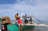 DSWD Region 6 - Western Visayas Quick Response Team delivered family food packs (FFPs) to families affected by the recent Super Typhoon Inday at Malalison Island in Culasi, Antique on Tuesday, 14 July. (PHOTO COURTESY OF DSWD Western Visayas)