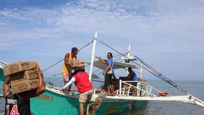 DSWD Region 6 - Western Visayas Quick Response Team delivered family food packs (FFPs) to families affected by the recent Super Typhoon Inday at Malalison Island in Culasi, Antique on Tuesday, 14 July. (PHOTO COURTESY OF DSWD Western Visayas)