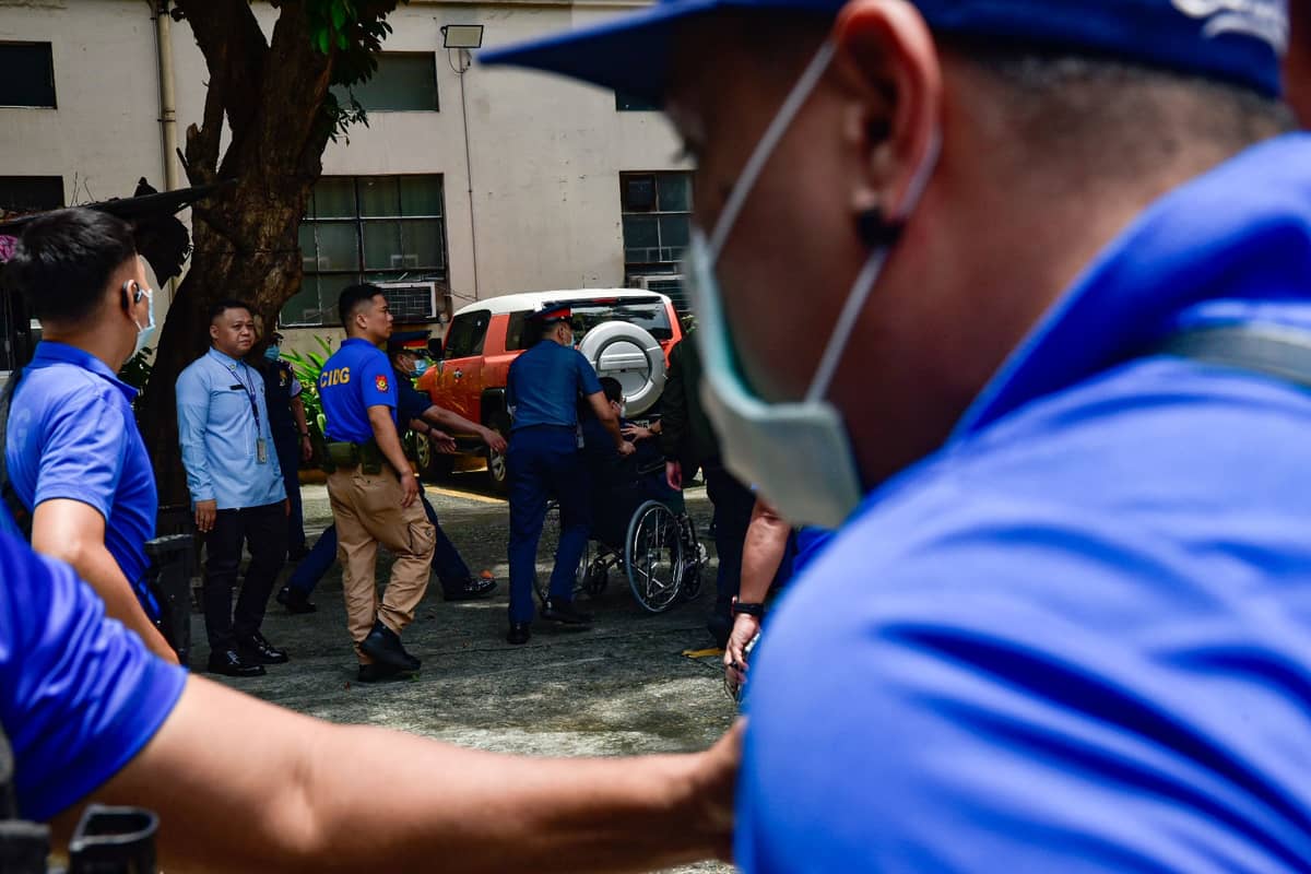 Sen. Rodante Marcoleta arrives at the Philippine General Hospital in a wheelchair under the escort of Criminal Investigation and Detection Group personnel. l Zedrich Xylak Madrid