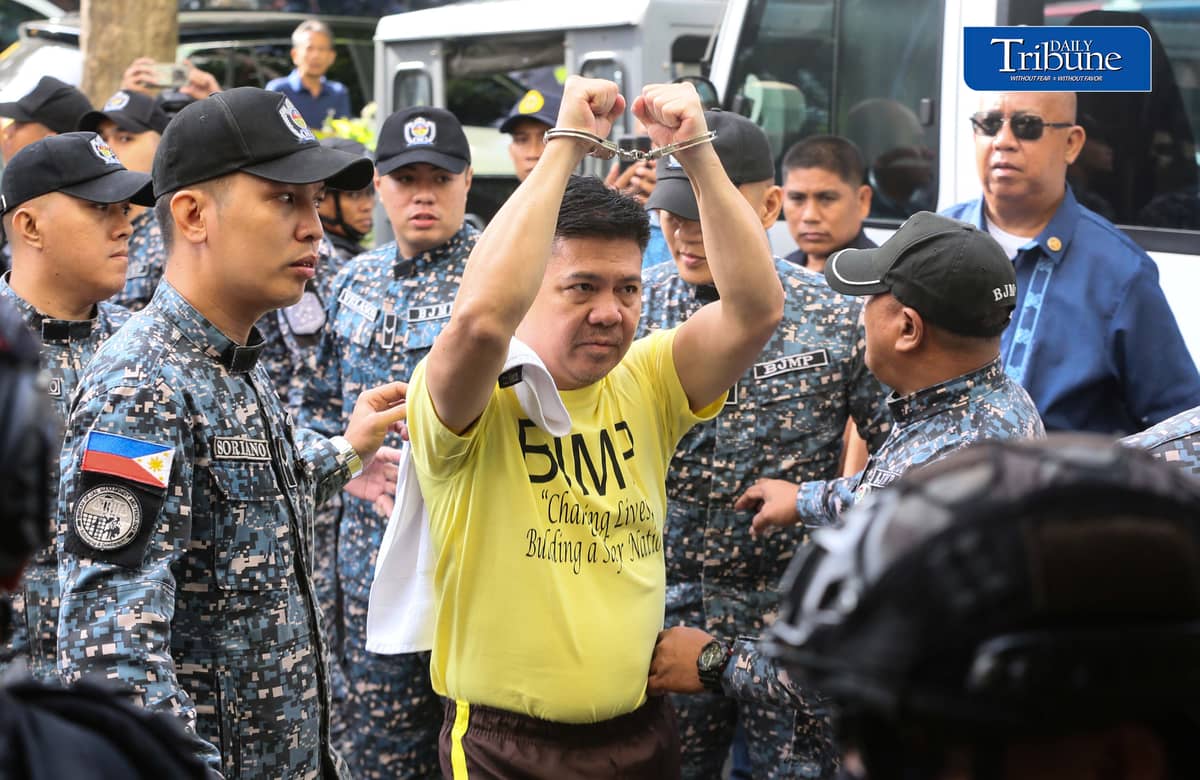 Former Rep. Mike Defensor and his co-accused businessmen Joseph Espiritu and Aristotle Viray arrive at the Sandiganbayan on Wednesday, 15 July 2026, where they plead not guilty to plunder charges. The case stemmed from allegations involving a ₱75-million donation to Sen. Rodante Marcoleta. | Photo by Analy Labor