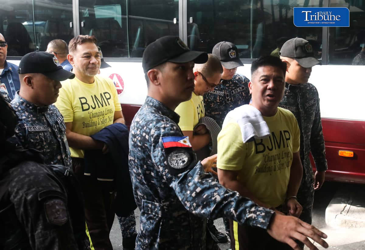 Former Rep. Mike Defensor and his co-accused businessmen Joseph Espiritu and Aristotle Viray arrive at the Sandiganbayan on Wednesday, 15 July 2026, where they plead not guilty to plunder charges. The case stemmed from allegations involving a ₱75-million donation to Sen. Rodante Marcoleta. | Photo by Analy Labor