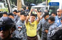 Former Rep. Mike Defensor and his co-accused businessmen Joseph Espiritu and Aristotle Viray arrive at the Sandiganbayan on Wednesday, 15 July 2026, where they plead not guilty to plunder charges. The case stemmed from allegations involving a ₱75-million donation to Sen. Rodante Marcoleta. | Photo by Analy Labor