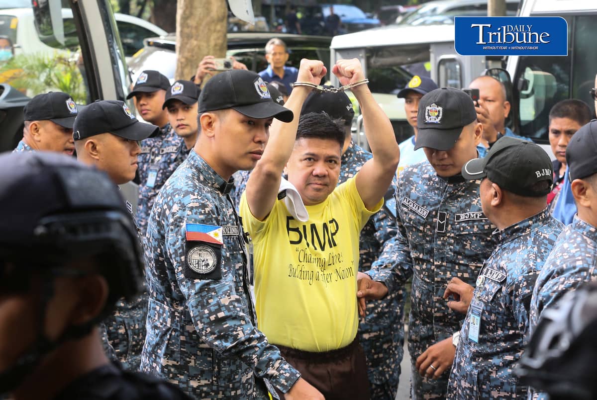 Former Rep. Mike Defensor and his co-accused businessmen Joseph Espiritu and Aristotle Viray arrive at the Sandiganbayan on Wednesday, 15 July 2026, where they plead not guilty to plunder charges. The case stemmed from allegations involving a ₱75-million donation to Sen. Rodante Marcoleta. | Photo by Analy Labor