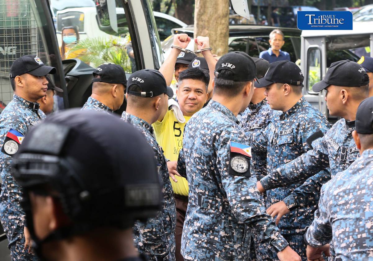 Former Rep. Mike Defensor and his co-accused businessmen Joseph Espiritu and Aristotle Viray arrive at the Sandiganbayan on Wednesday, 15 July 2026, where they plead not guilty to plunder charges. The case stemmed from allegations involving a ₱75-million donation to Sen. Rodante Marcoleta. | Photo by Analy Labor