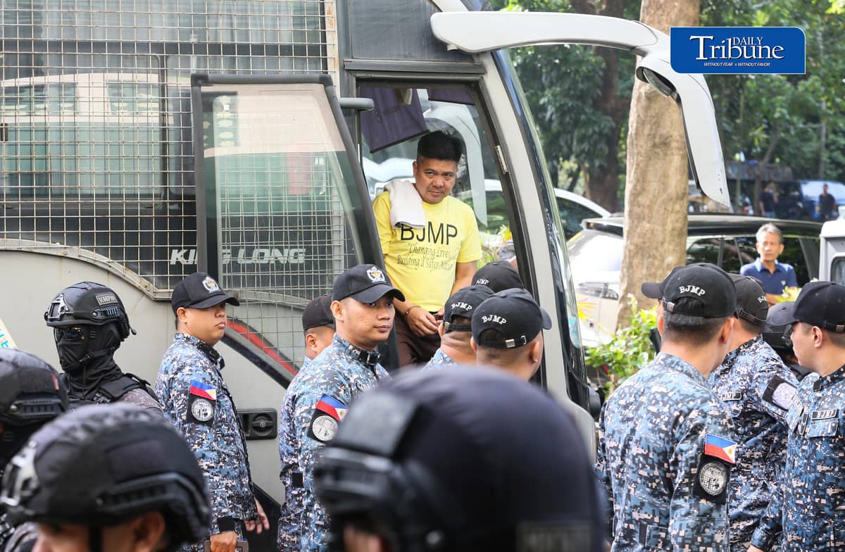Former Rep. Mike Defensor and his co-accused businessmen Joseph Espiritu and Aristotle Viray arrive at the Sandiganbayan on Wednesday, 15 July 2026, where they plead not guilty to plunder charges. The case stemmed from allegations involving a ₱75-million donation to Sen. Rodante Marcoleta. | Photo by Analy Labor