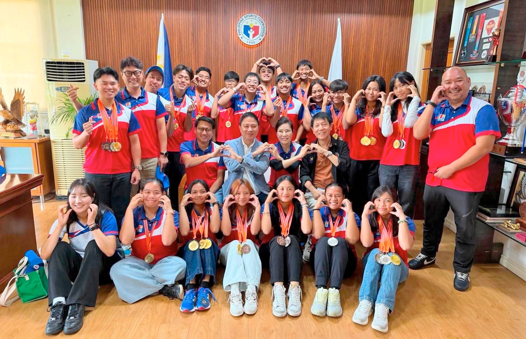 PSC chairman Patrick Gregorio welcomes the young archers who emerged victorious in the Singapore Youth Archery Championships at the Bukit Gombak Stadium recently.