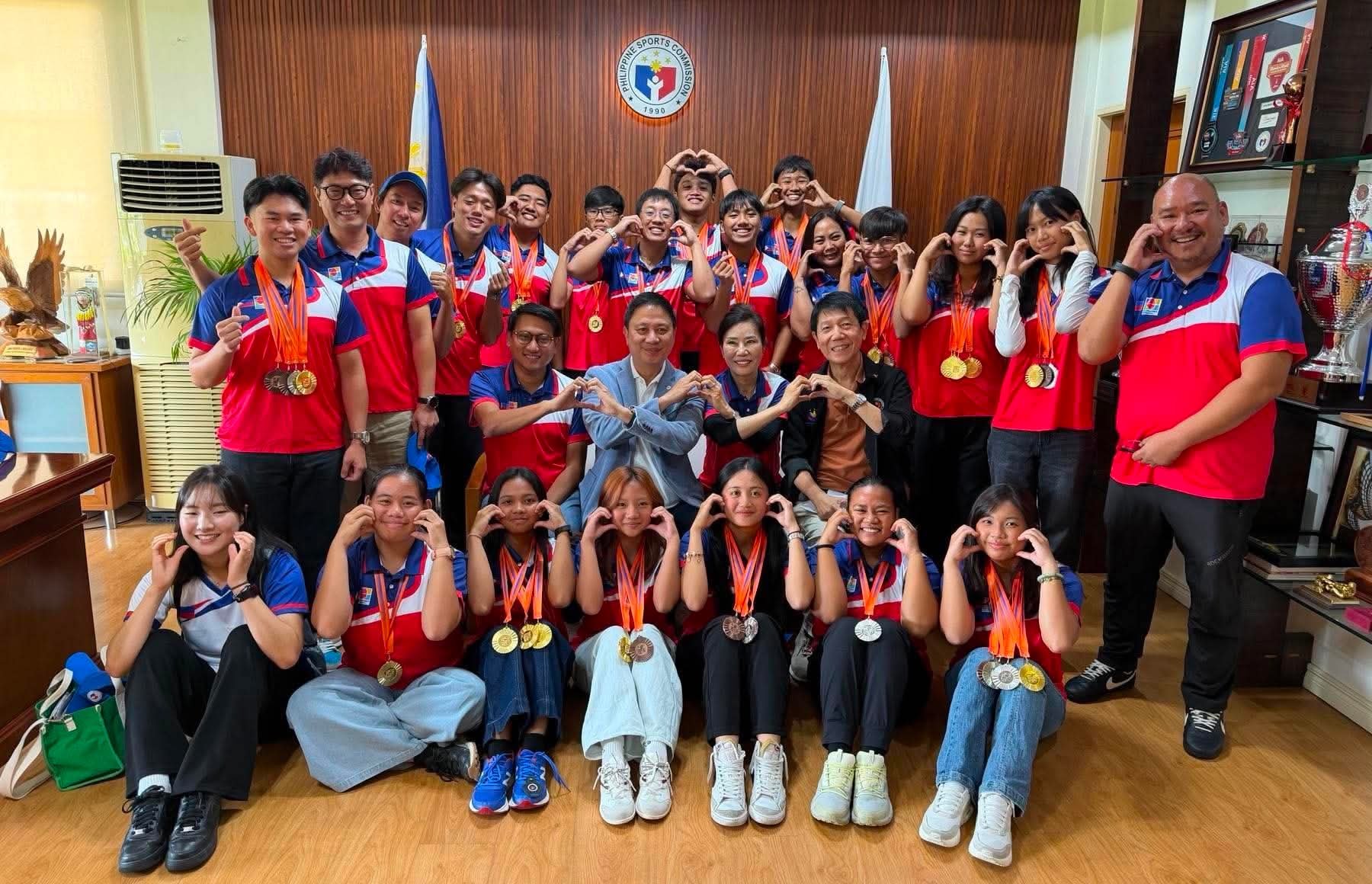 PSC chairman Patrick Gregorio welcomes the young archers who emerged victorious in the Singapore Youth Archery Championships at the Bukit Gombak Stadium recently.
