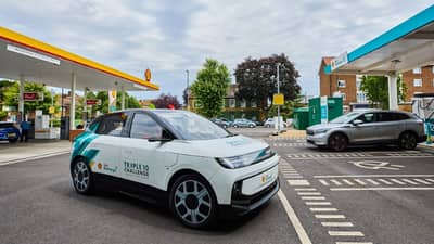 CHARGING at a Shell station, the Triple 10 Challenge concept car demonstrates how a smaller battery and immersion cooling can support faster charging and better energy use