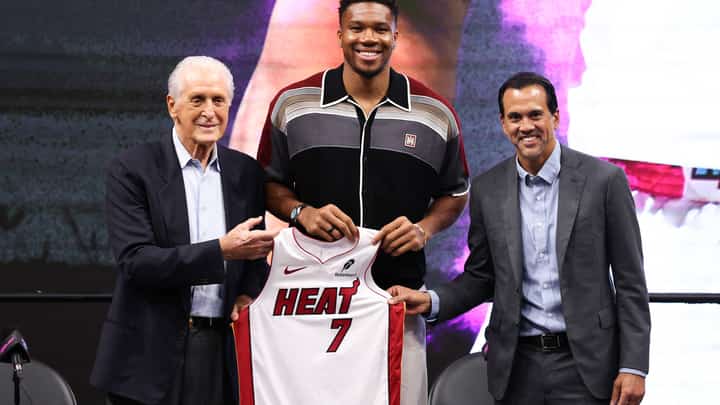 GIANNIS Antetokounmpo gets a warm welcome from Miami Heat president Pat Riley and Filipino-American head coach Erik Spoelstra during a media presentation on Friday (Manila time).