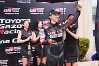 CELEBRATING a strong run, Toyota Motor Philippines president Masando Hashimoto raises his fist during Race Weekend 2 at Clark International Speedway.