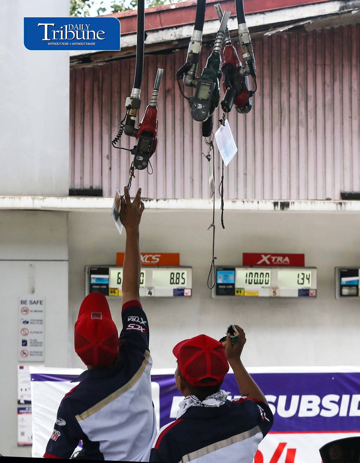 (July 18 2026) Gasoline Attendant tend motorists gas up at Petron gas station along Kalayaan in Quezon City on Saturday July 19, 2026. Oil industry Source said Major pump price hikes are expected next week, P10.50 per liter increase in diesel and P4.50 in gasoline amid renewed tensions in the Middle East. Photo/Analy Labor