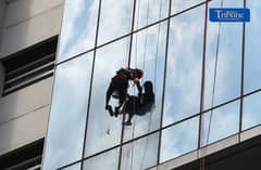 (July 18 2026) Workers were seen hang on the rope cleaning the windows of the building at Ortigas center on Saturday July 18 2026. Photo/Analy Labor