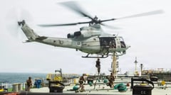 U.S. launches 7th night of bombings
as Iran hits bases, mulls offensive