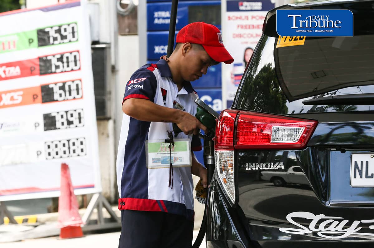 (July 18 2026) Gasoline Attendant tend motorists gas up at Petron gas station along Kalayaan in Quezon City on Saturday July 19, 2026. Oil industry Source said Major pump price hikes are expected next week, P10.50 per liter increase in diesel and P4.50 in gasoline amid renewed tensions in the Middle East. Photo/Analy Labor