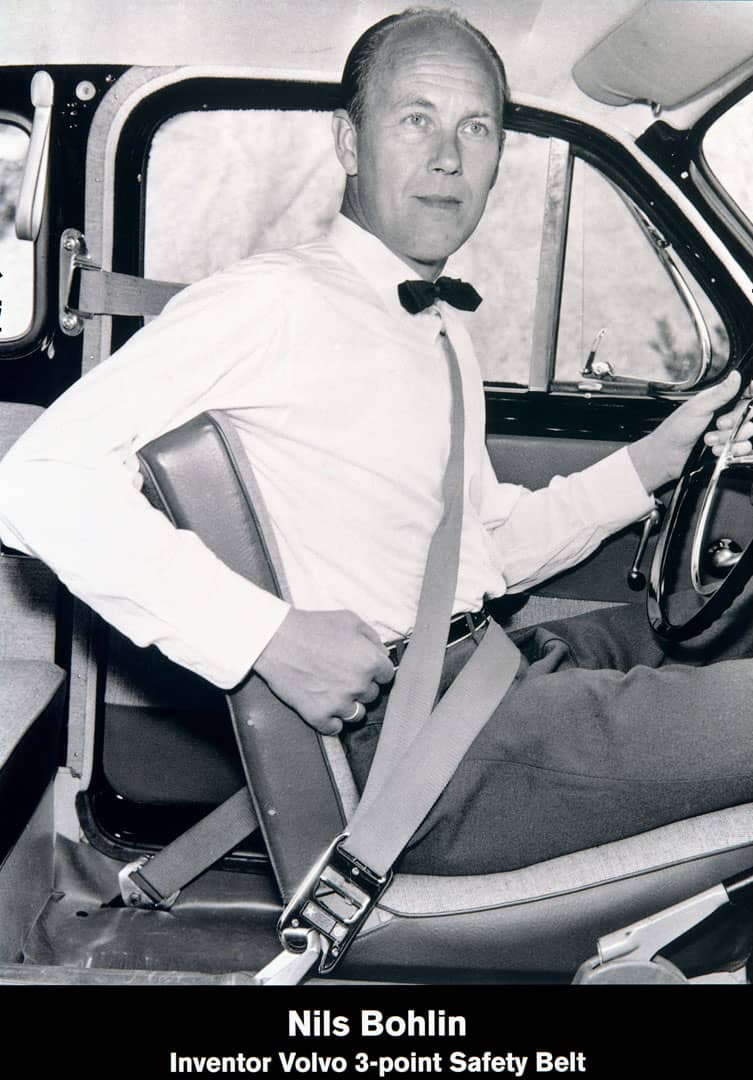 PIONEER Nils Bohlin demonstrates the three-point seat belt that Volvo introduced in 1959.