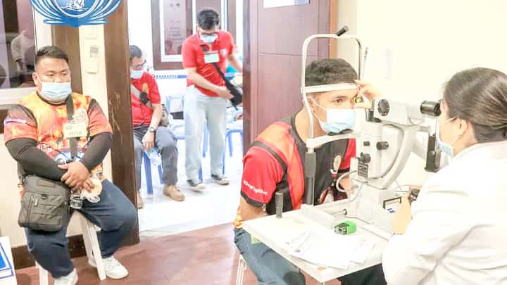 VOLUNTEER firefighters undergo checkup at the Tzu Chi Eye Center.
