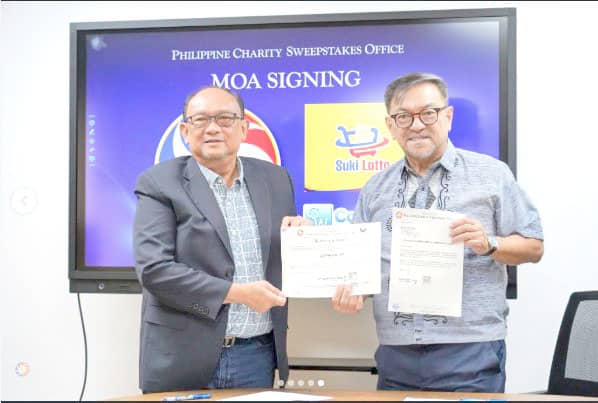 Under a recently signed memorandum of agreement, ComWorks, through Suki Lotto, will serve as a Level 2 corporate-owned chain business PCSO Lotto authorized agent, allowing it to sell and distribute PCSO lottery tickets through point-of-sale terminals in retail outlets nationwide. PCSO general manager Melquiades Robles (right) and ComWorks president Martin Leyeza display copies of the MoA.