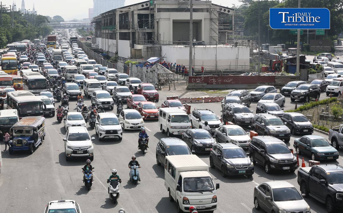 (July 20 2026) Motorists persevere the bumper to bumper traffic along Commonwealth Avenue on Monday morning July 20 2026. Photo/Analy Labor