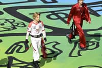 (L-R) Jimin and Jin of BTS performs during FIFA World Cup 2026™ Topps Final Halftime Show at New York New Jersey Stadium on July 19, 2026 in East Rutherford, New Jersey.