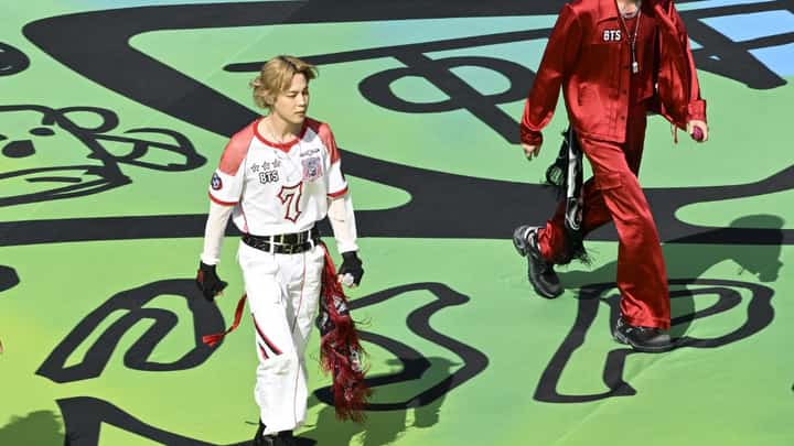 (L-R) Jimin and Jin of BTS performs during FIFA World Cup 2026™ Topps Final Halftime Show at New York New Jersey Stadium on July 19, 2026 in East Rutherford, New Jersey.