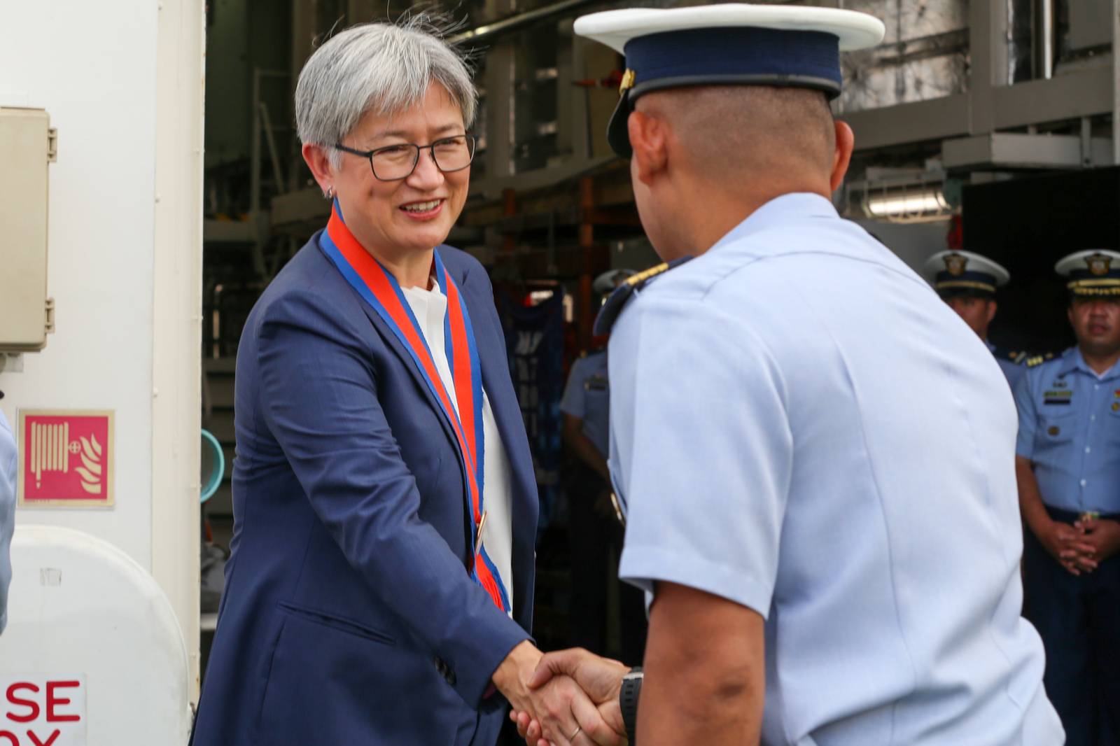 The Philippine Coast Guard (PCG) welcomed Australian Foreign Minister Penny Wong aboard BRP Teresa Magbanua at Pier 15, Manila, on 21 July 2026. She was received by PCG Commandant Admiral Ronnie Gil Gavan and Department of Transportation Undersecretary Mark Steven Pastor. During the visit, Wong announced additional Australian assistance to enhance the PCG's aerial and maritime drone capabilities, as well as its training programs.

In his remarks, Gavan highlighted the eight decades of diplomatic relations between Australia and the Philippines, emphasizing the strong partnership between the two countries in the areas of economic cooperation, maritime security, and international cooperation.

Wong also expressed concern over China's "destabilizing and dangerous" actions in the disputed South China Sea, including what she described as aggressive actions against Philippine Navy personnel during an incident at Ayungin Shoal on 20 July.
