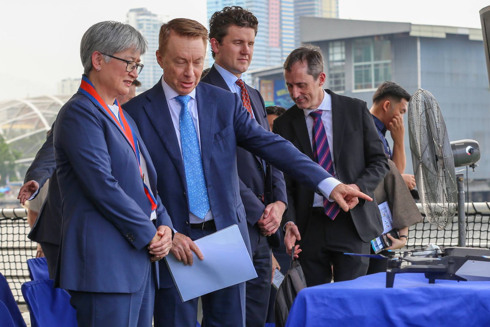 The Philippine Coast Guard (PCG) welcomed Australian Foreign Minister Penny Wong aboard BRP Teresa Magbanua at Pier 15, Manila, on 21 July 2026. She was received by PCG Commandant Admiral Ronnie Gil Gavan and Department of Transportation Undersecretary Mark Steven Pastor. During the visit, Wong announced additional Australian assistance to enhance the PCG's aerial and maritime drone capabilities, as well as its training programs.

In his remarks, Gavan highlighted the eight decades of diplomatic relations between Australia and the Philippines, emphasizing the strong partnership between the two countries in the areas of economic cooperation, maritime security, and international cooperation.

Wong also expressed concern over China's "destabilizing and dangerous" actions in the disputed South China Sea, including what she described as aggressive actions against Philippine Navy personnel during an incident at Ayungin Shoal on 20 July.