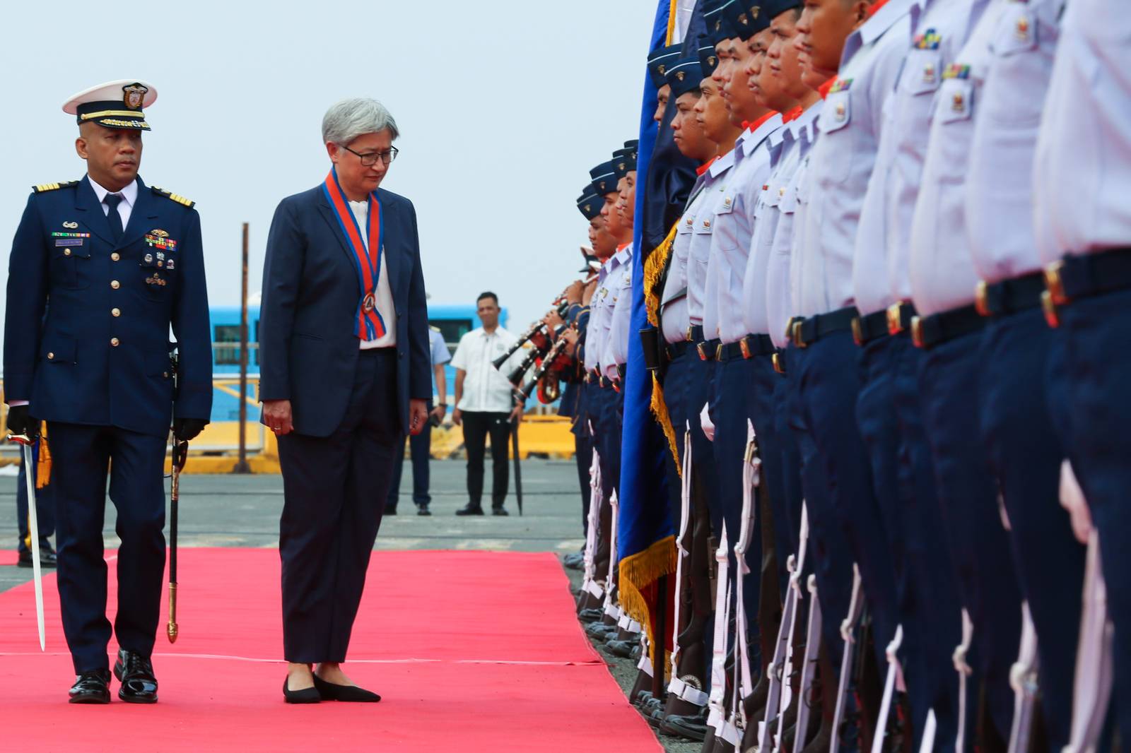 The Philippine Coast Guard (PCG) welcomed Australian Foreign Minister Penny Wong aboard BRP Teresa Magbanua at Pier 15, Manila, on 21 July 2026. She was received by PCG Commandant Admiral Ronnie Gil Gavan and Department of Transportation Undersecretary Mark Steven Pastor. During the visit, Wong announced additional Australian assistance to enhance the PCG's aerial and maritime drone capabilities, as well as its training programs.

In his remarks, Gavan highlighted the eight decades of diplomatic relations between Australia and the Philippines, emphasizing the strong partnership between the two countries in the areas of economic cooperation, maritime security, and international cooperation.

Wong also expressed concern over China's "destabilizing and dangerous" actions in the disputed South China Sea, including what she described as aggressive actions against Philippine Navy personnel during an incident at Ayungin Shoal on 20 July.