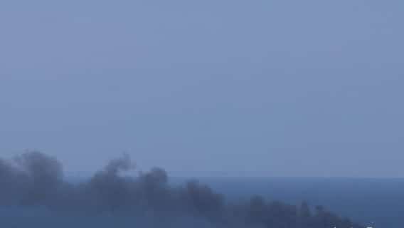 Smoke rises from the civilian cargo ship Golden Leo after an alleged Russian missile strike in the Black Sea near Odesa, Ukraine, on 19 July 2026. Ukraine's navy said the attack killed six people aboard the Turkish-owned grain vessel and left four others missing as it departed the combat zone.