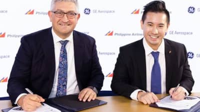 GE Aerospace-Pal deal Jason Tonich, chief Commercial Sales and Customer officer of GE Aerospace (left) and Lucio Tan III, president and chief operating officer of PAL Holdings Inc. during the signing of agreement for the GEnx-1B engines to power the flag carrier's new fleet. The signing was held in United Kingdom on 20 July 2026.