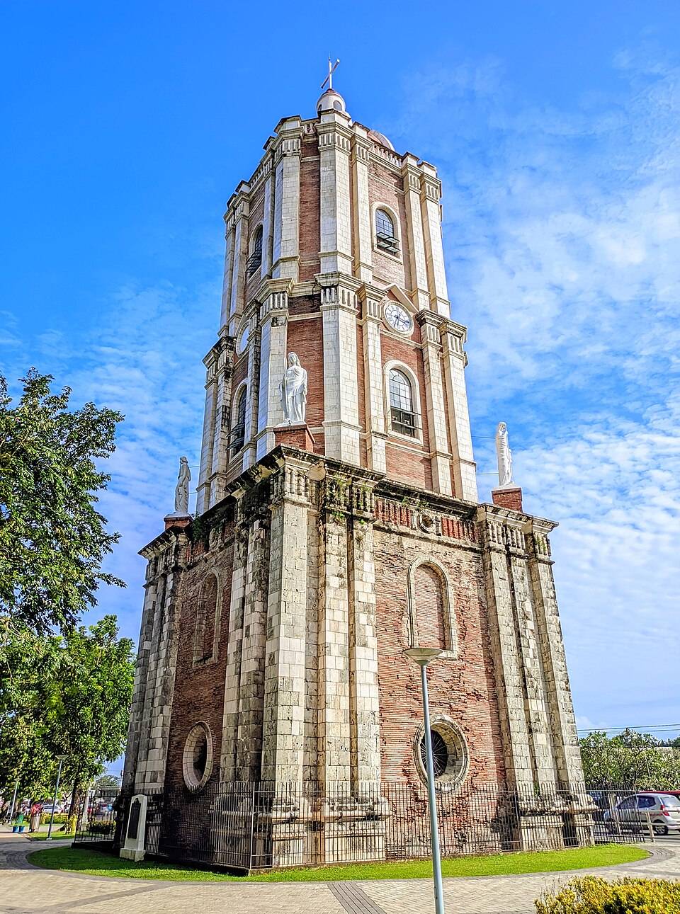 The Jaro Belfry rises beside the plaza, a lasting symbol of the district’s heritage.