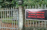 Tarpaulins, such as this one hanging on the fence of UP Botanical Garden, calling for the opening of bank, tax and AMLC records have sprouted in public places around Tacloban City immediately after the Senate, sitting as an impeachment court, approved the House prosecution's requests to subpoena the said records of Vice Sara Duterte and her husband Manases Carpio. The tarpaulins carry no name of any organization responsible for this initiative.