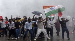 Modi vows punishment for exam fraud fueling protests